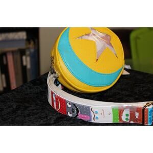 NWT Pixar Pin Crossbody with bonus Attachable Pixar character Strap